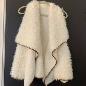 SUPER SOFT white fluffy vest with tan trim